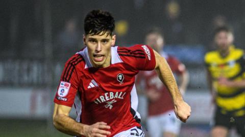 Stephan Negru in action for Salford City v Barrow