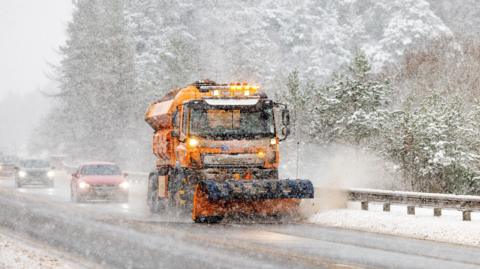 A snow plough out in Scotland.