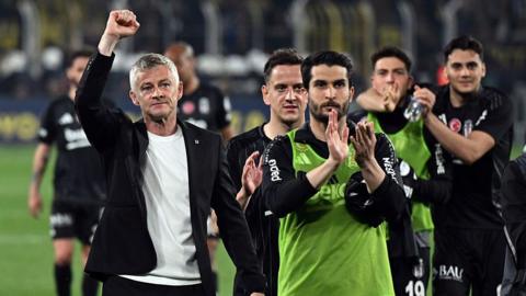 Ole Gunnar Solksjaer celebrates with his Besiktas players