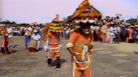 Belizean dancers dress in colourful clothing.