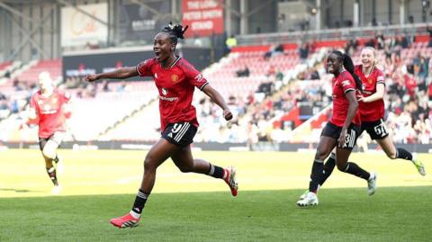 Melvine Malard celebrates