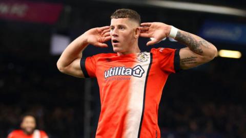 Ross Barkley of Luton Town celebrates after scoring the team's third goal during the Premier League match between Luton Town and Arsenal FC at Kenilworth Road