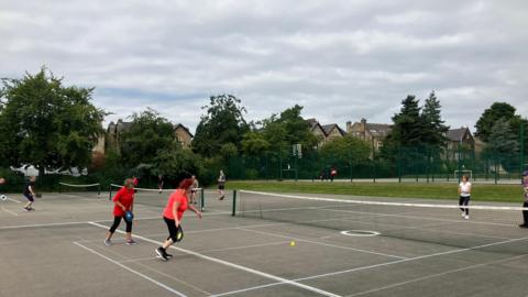 Pickleball players in Greenhead Park