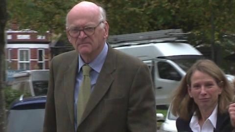 Nicholas Prest, 71, and his wife Anthea Prest, 70, walking next to each other into Newport Crown Court