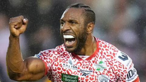 Edwin Ipape celebrates his try for Leigh against Wigan
