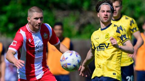 Action from Hornchurch v Torquay United