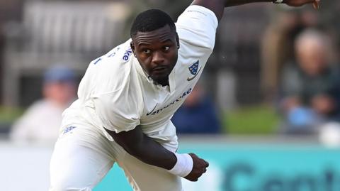 Jayden Seales bowling for Sussex