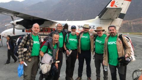 The group before boarding a plane