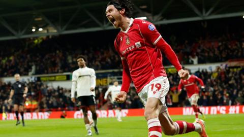 Kieffer Moore screams in celebration