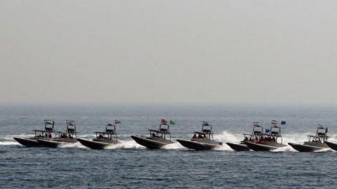 Seven small boats belonging to the IRGC on the water.