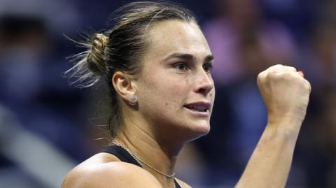 Aryna Sabalenka celebrates victory over Zheng Qinwen