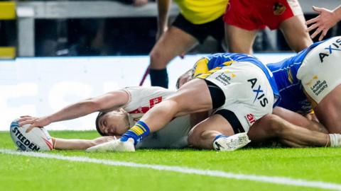 Jon Bennison reaches out to the tryline for St Helens
