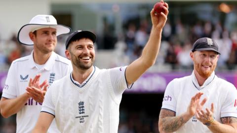 Mark Wood celebrates a five-wicket haul