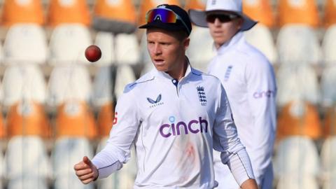 England stand-in skipper Ollie Pope throws the ball to himself