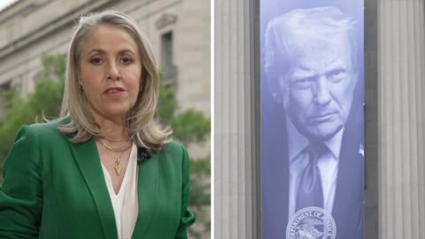 On the left, Sarah Smith in a green blazer. On the right, Donald Trump's face on a banner hanging ouside a building.