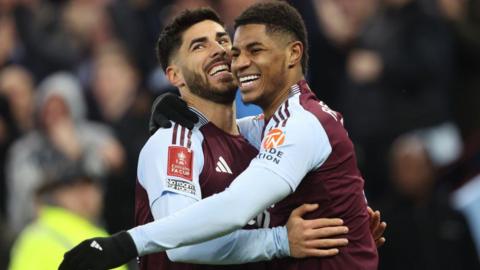 Aston Villa celebrate scoring against Cardiff