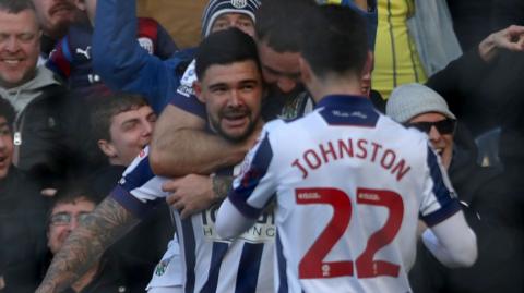 Alex Mowatt celebrates giving West Brom the lead against Oxford