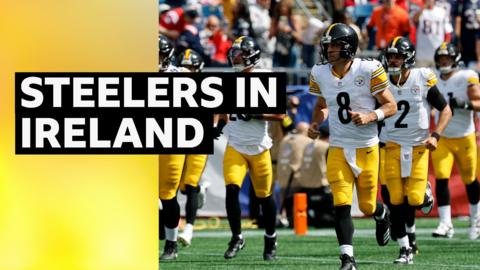 Pittsburgh Steelers running out on the field of play