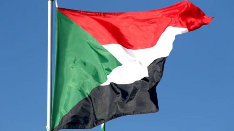 The Sudanese national flag.