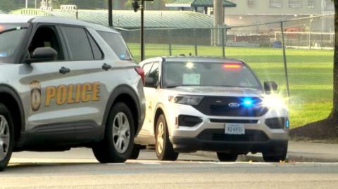 Two police cars with flashing lights on at VSU