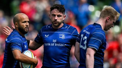 Jamison Gibson-Park, Hugo Keenan and Jamie Osborne celebrate a Leinster try