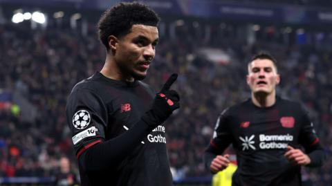  Malik Tillman of Bayer Leverkusen celebrates scoring his team's first goal