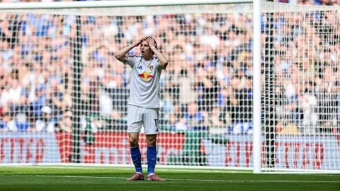  Brenden Aaronson of Leeds United after seeing his shot saved.