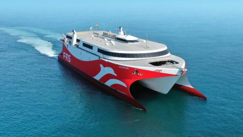 A red and white ferry in the sea