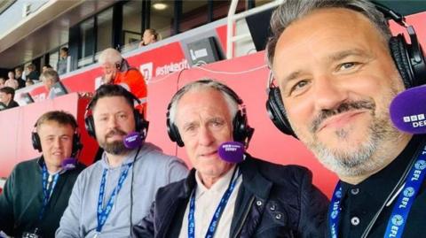 Eric Steele (second from right) in the commentary box alongside colleagues from BBC Radio Derby