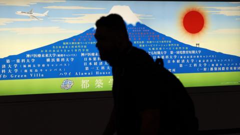 Taulupe Faletau after landing in Japan