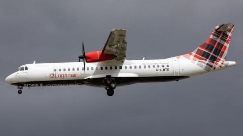 A Loganair plane in the sky