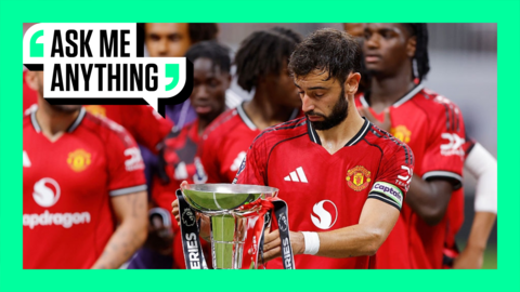 Bruno Fernandes of Manchester United holds the Summer Series League trophy 