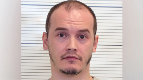 Oliver Lewin with a white background