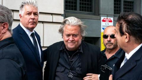  Steve Bannon, former advisor to President Donald Trump, and attorney Matthew Evan Corcoran, depart the E. Barrett Prettyman U.S. Courthouse 