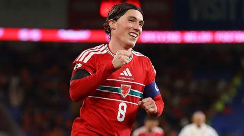 Harry Wilson celebrates scoring against North Macedonia