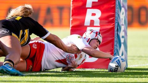 Katie Mottershead crashing over to score for St Helens.