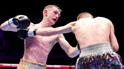 Colm Murphy fighting  Ruadhan Farrell at the SSE Arena