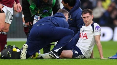 Ben Davies of Tottenham Hotspur reacts before leaving the game injured during the Premier League match between Tottenham Hotspur and West Ham United at Tottenham Hotspur Stadium on January 17, 2026