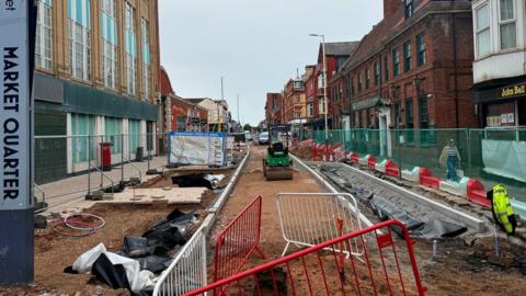 Roadworks which have closed King Street in Southport near entrance to Southport Market.