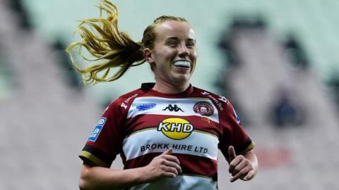 Wigan's Ruby Hunter smiling.