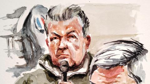 Dominique Pelicot, who has allegedly drugged and raped his then-wife Gisele Pelicot, appears with his lawyer Beatrice Zavarro at the courthouse in Avignon, France, December 16, 2024 in this courtroom sketch