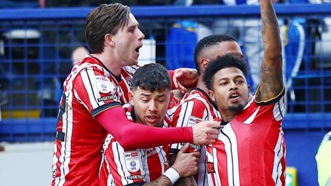 Sheffield United players celebrate Rhian Brewster's goal at Sheffield Wednesday