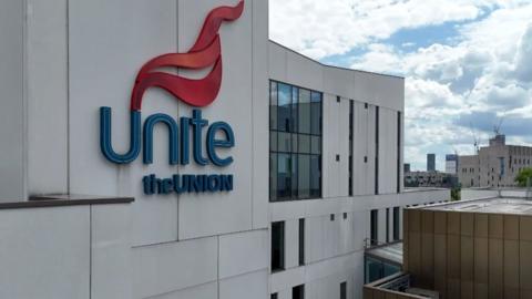 Unite the union sign on building