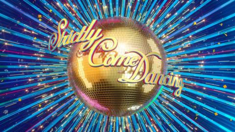 Strictly Come Dancing logo with glitter ball

