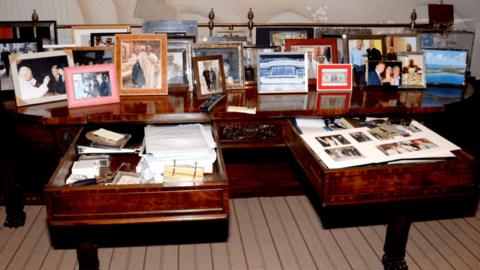 A view of drawers and framed photos shown in Jeffrey Epstein's Manhattan home are seen in this image released by the Department of Justice in Washington, D.C., U.S