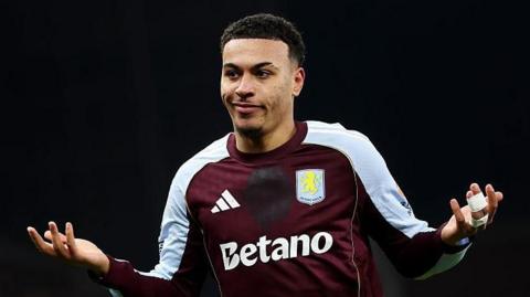 Aston Villa's Morgan Rogers celebrates scoring against Manchester United