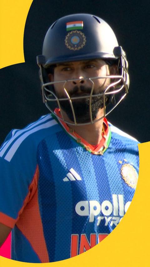 Shreyas Iyer smiles to the crowd after hitting a half-century