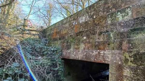 A bridge made from large rectangular stone blocks