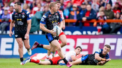 Leeds Rhinos full-back runs in a try against Hull Kingston Rovers.