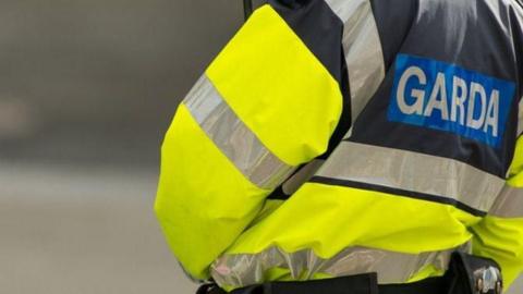 Irish police officer photographed from behind